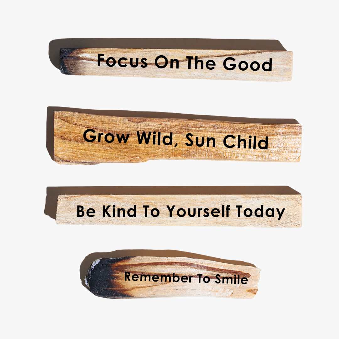 Image of Four Engraved Palo Santo sticks engraved with uplifting messages